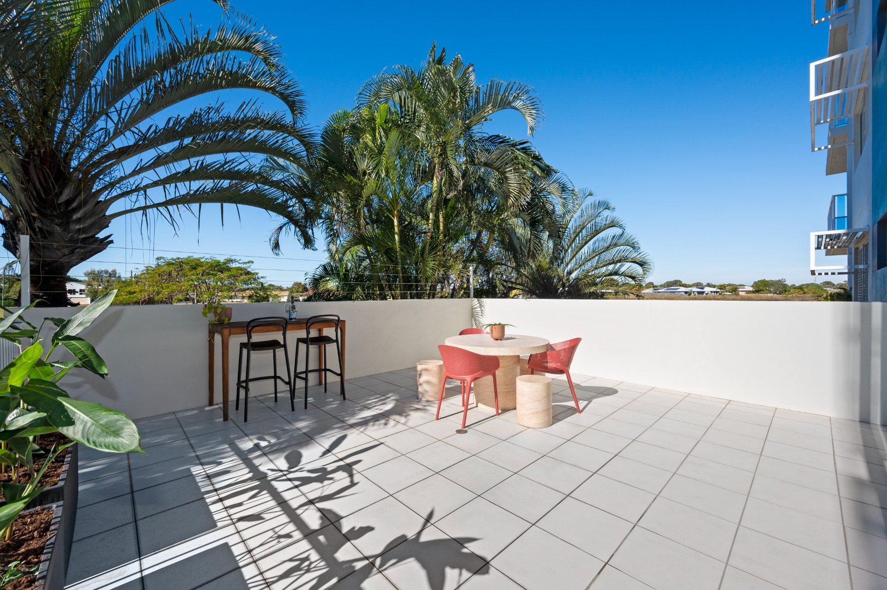Large private ground-floor patio at Koola Palms Apartment 101